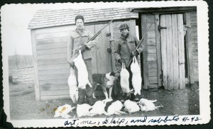 Vincent and Art with the catch of Jackrabbits sometime in 1941-42.  At the time, jackrabbits were numerous and a nuisance.  He had similar photos with skunk, and ducks, etc.  