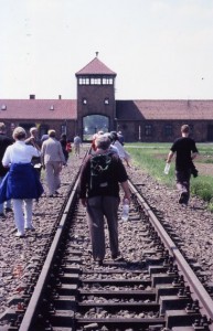 A quiet walk on a beautiful day May 4, 2000.   Approaching the entrance to Birkenau death camp, Poland.