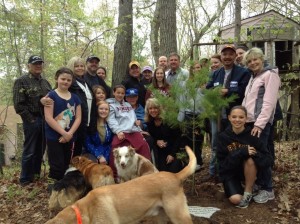 Memorial Day 2013, Lynn Elling with family at their Lake Cabin, celebrate Donna's life and inter her ashes at the base of a favored tree. 