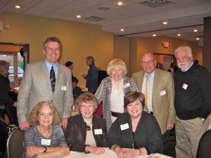 Some of the guests at the anniversary, Feb. 28. Center front is Judy Schaubach, then VP of MEA; 2nd from left in top row is Sandra Peterson, then President MFT.  Others: front row Sharon Kjellberg and Denise Specht; top row from left Paul Mueller, Greg Burns and Dick Bernard