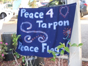 Community Peace Initiative relating to such topics as anti-bullying in Tarpon Springs, Florida.  I was drawn in by a garden full of handmade Peace Flags in a community pocket-park.