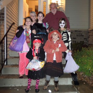 front, counter-clockwise, Lucy, Addy and Kelly and friends trick or treat Grandma and Grandpa, October 31, 2013