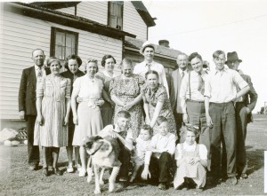 Many of Busch family, and neighbors, pose with the Bernards June, 1941.  Note particularly Edith, 3rd from left; Mary, 4th from left, and Vincent 2nd from right.  Dad, Mom and Richard (me) are roughly at center.  