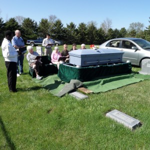 Graveside May 21, 2014.  Edith's grave next to that her mother, Rosa, and father Ferdinand Busch.  Fr. Jerome Okafor presiding.  Brother Vincent nearest the car.