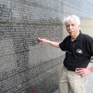 Barry Riesch identifies name of Vietnam casualty, Joseph Sommerhauser, May 26, 2014, at the Vietnam Wall, MN State Capitol Grounds.