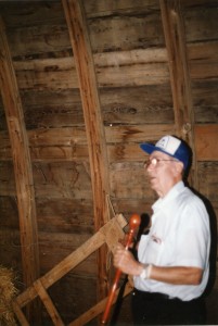 Henry Bernard with his roof beams in the Busch barn, June 1991.  RIP Nov. 7, 1997