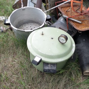 Pressure cookers at the farm (the back one sans lid.