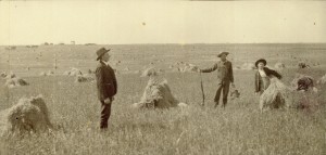 Grandpa Ferd Busch with shotgun and game  in summer of 1907, viewed from the north of his new farm home.  At  left, his Dad, Wilhelm Busch; at right his brother Frank.  At the time, Ferdinand was 26 years of age.