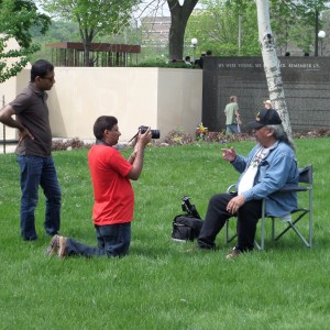 Ehtasham interviewing Native American author and Vietnam War veteran Jim Northrup, Memorial Day, 2014, Vets for Peace gathering.